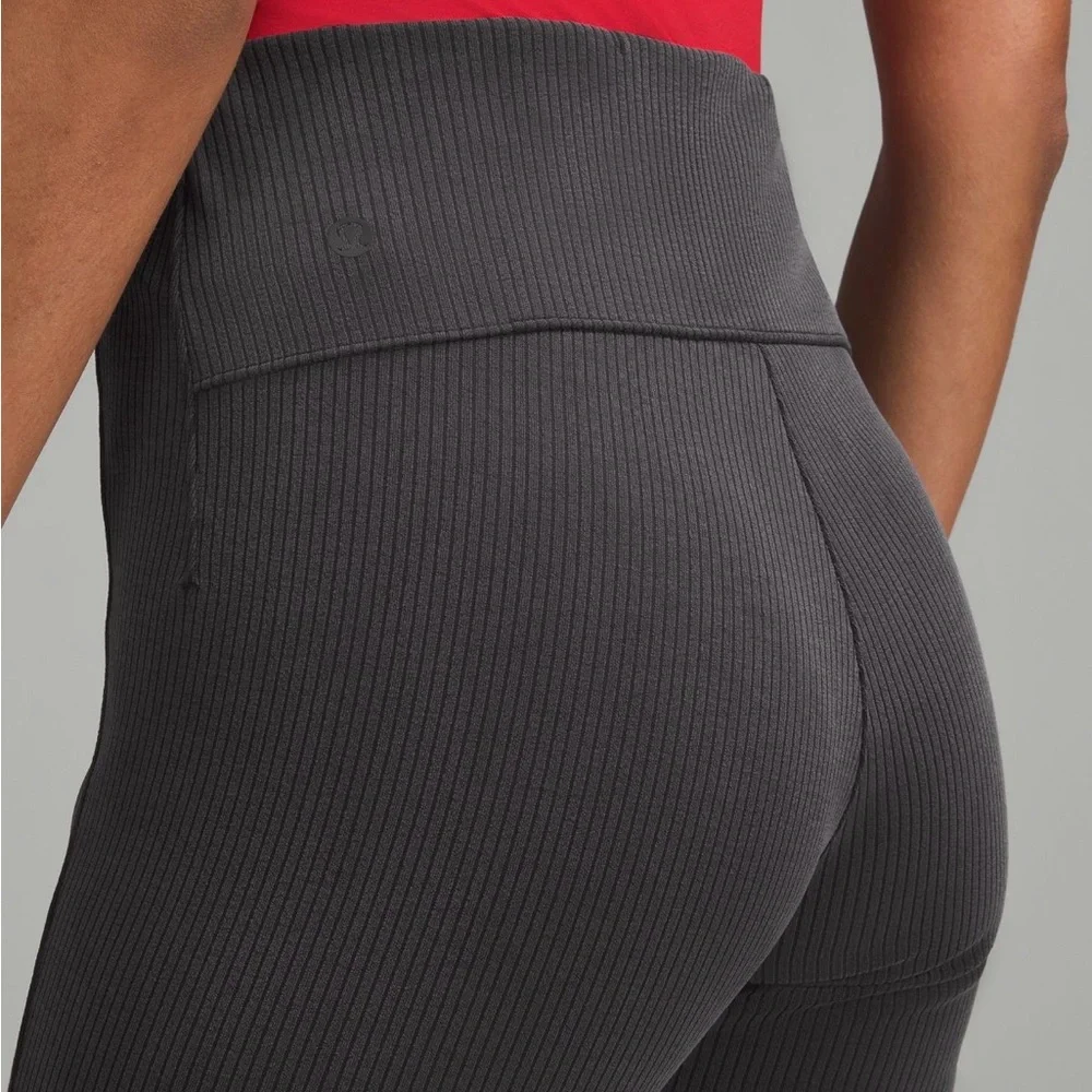 Like New Lululemon Athletica Ribbed Softstreme Flared Leg Pant, Black/Dk. Gray 8 - Picture 1 of 13